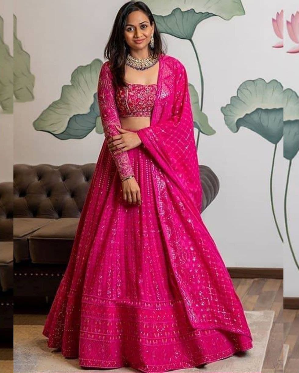 Rani Pink Colour Embroidered Semi Stitched Net Lehenga Choli Collection